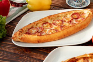 Close up of Turkish Pide bread on wooden table