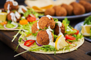 tortilla-wrap-with-falafel-fresh-salad-vegan-tacos-vegetarian-healthy-food