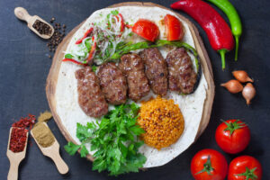 turkish food kofte stack of meatballs with pilav rice